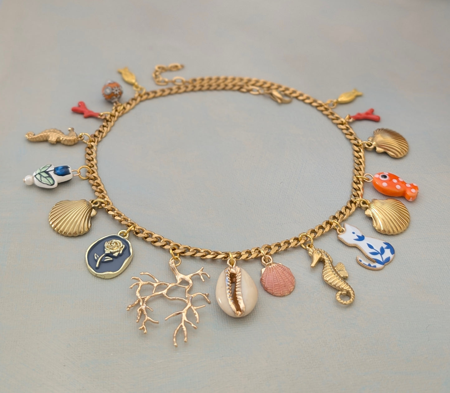 CARA Multi charm gold chain necklace