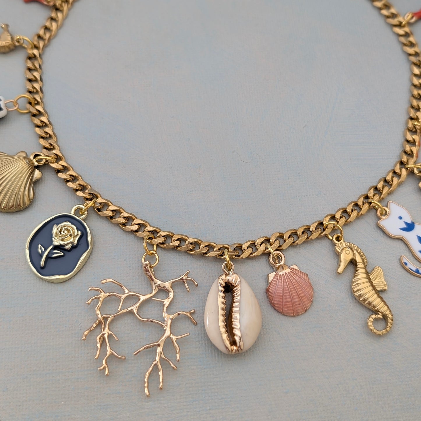 CARA Multi charm gold chain necklace