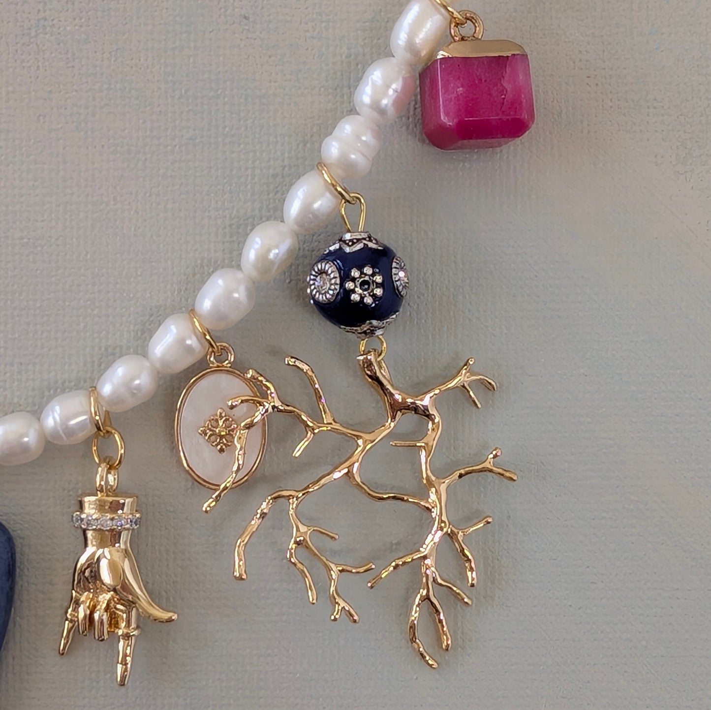 Gold and Pearl Multi Charm Necklace