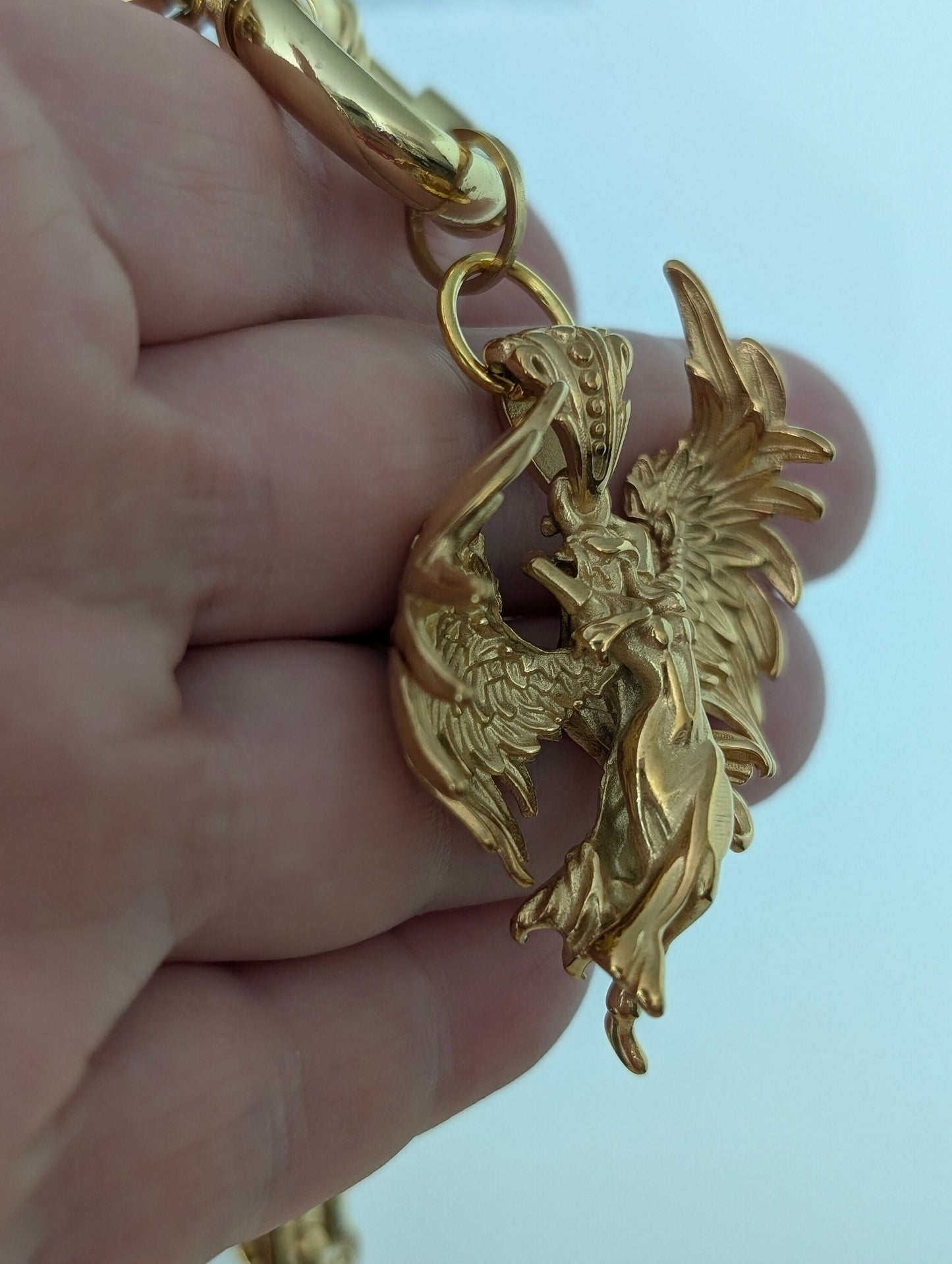 Chunky gold Chain and angel pendant choker