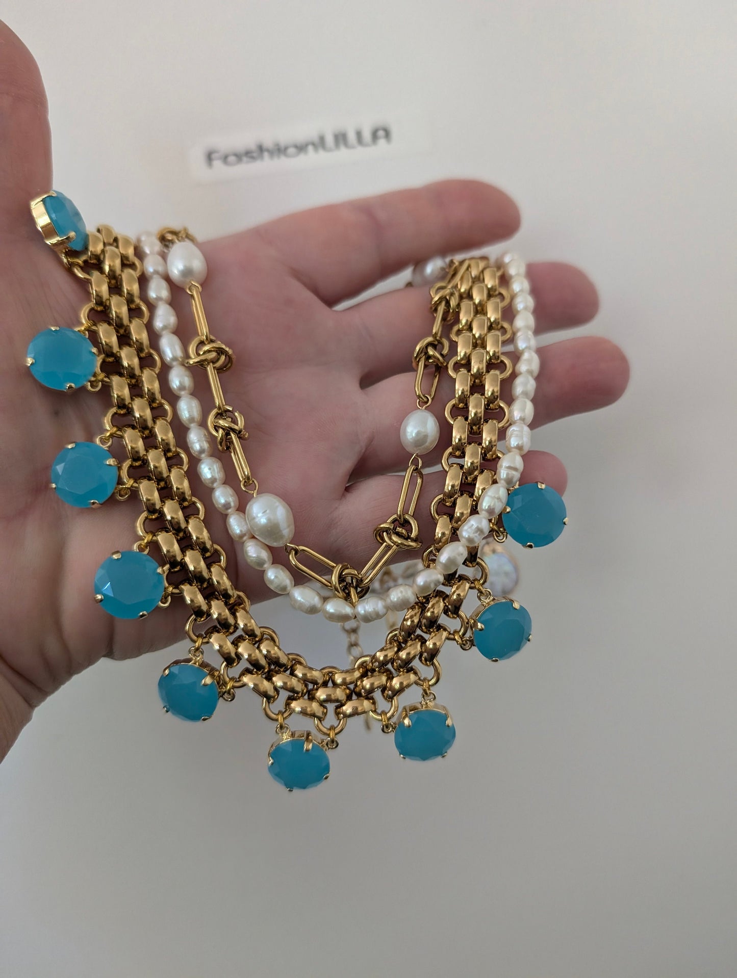 Chunky gold chain necklace with turquoise charms