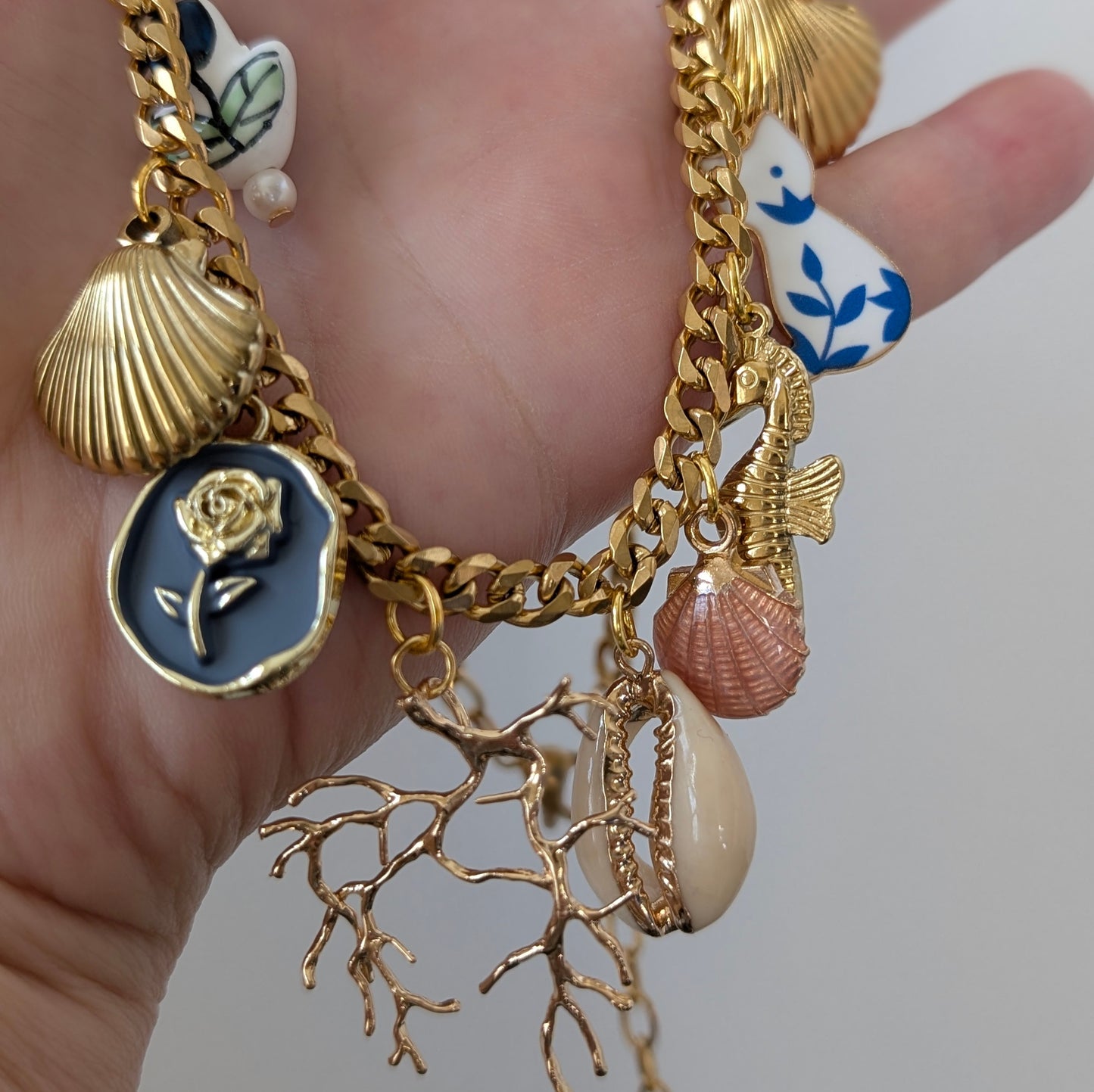 CARA Multi charm gold chain necklace