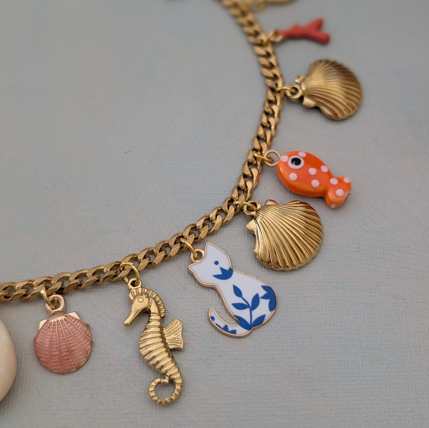 CARA Multi charm gold chain necklace