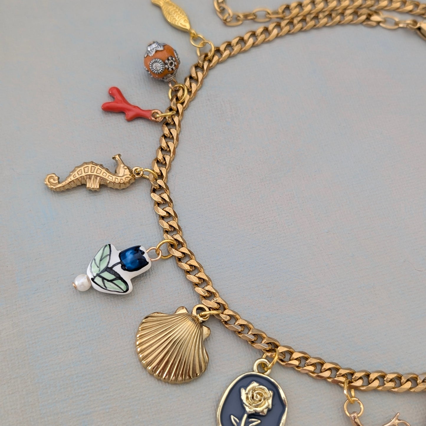 CARA Multi charm gold chain necklace