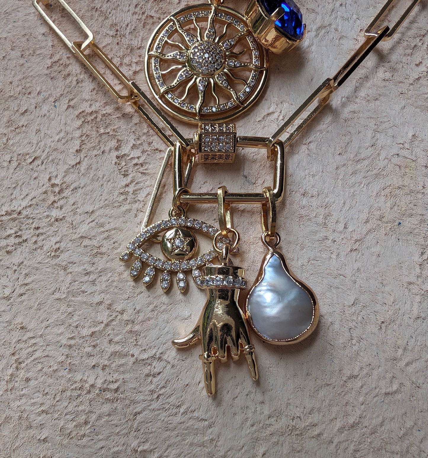 Unique Gold Choker with Sparkling Sapphire Charm